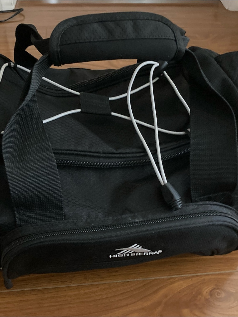 High Sierra Black Duffel Bag with White Accent Cord